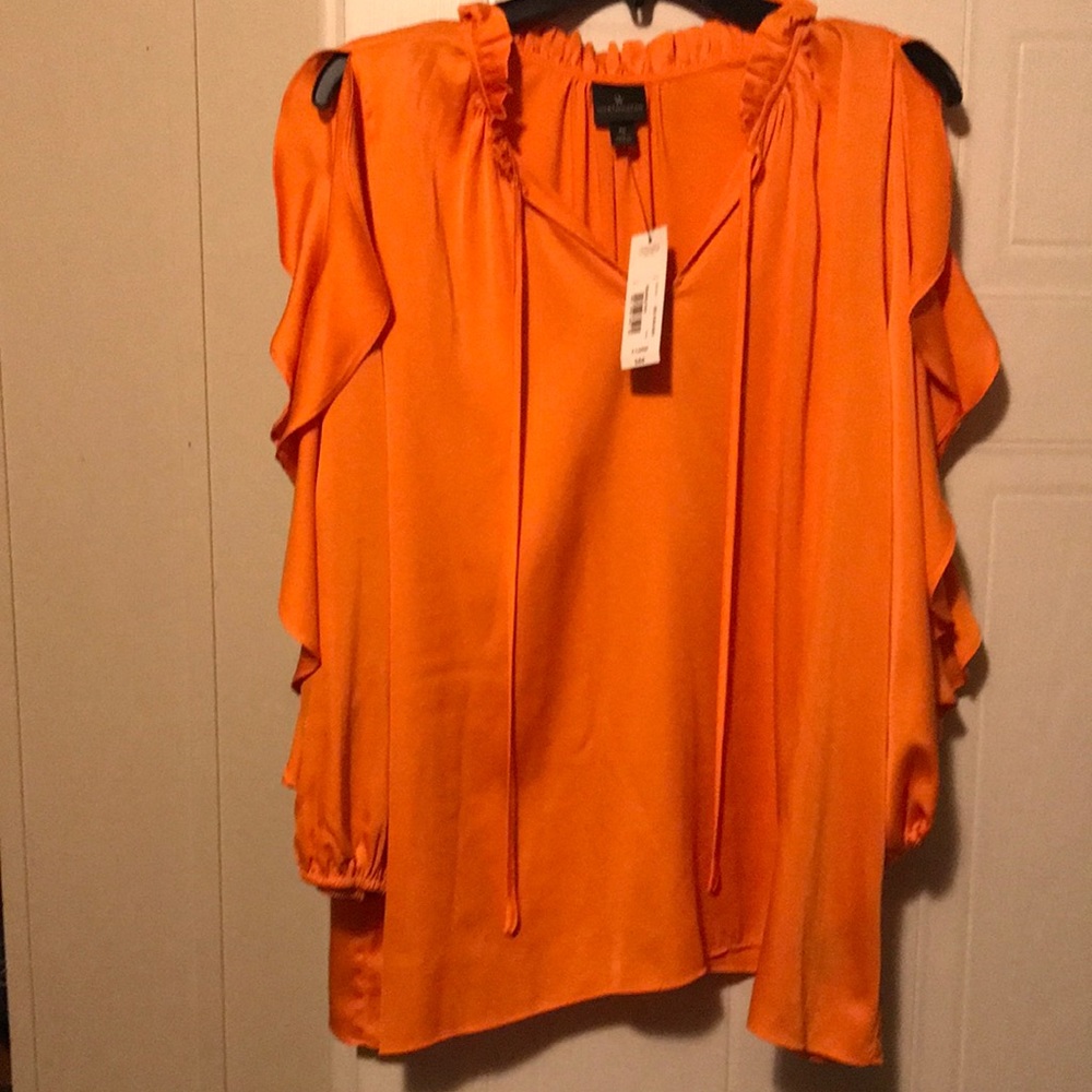 Xl orange pop cold shoulder blouse %100 polyester, new with tags.